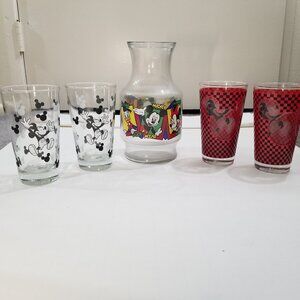 Mickey mouse vase; two sets of drinking glass cups; and one CD